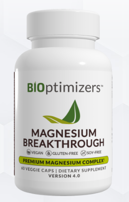 Magnesium Breakthrough product bottle with calming lavender and a person sleeping peacefully